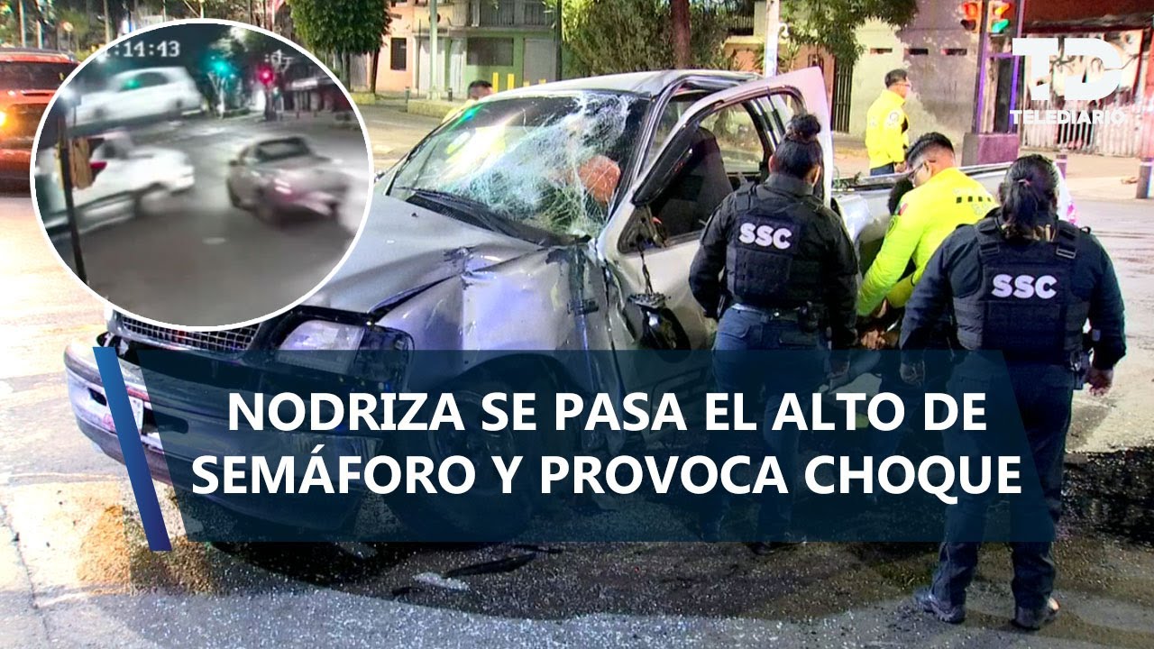 Tráiler nodriza se pasa luz roja de semáforo y provoca choque en Iztacalco