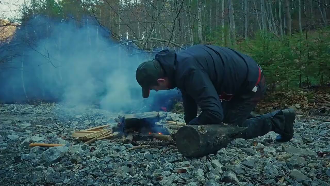 Man Cooking Meat on Stone in the Jungle  Primitive Forest Cooking 