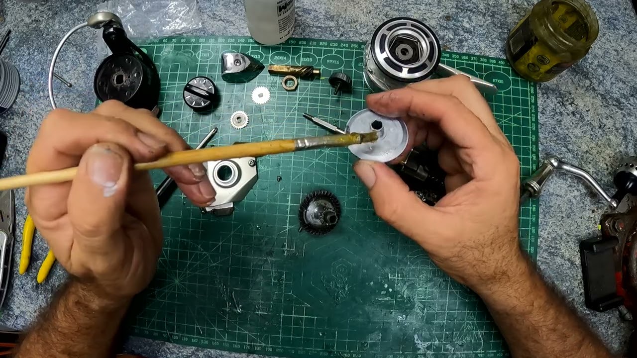 CARRETE O REEL DE PESCA RYOBI CAMBIO DE CORONA Y PIÑONES