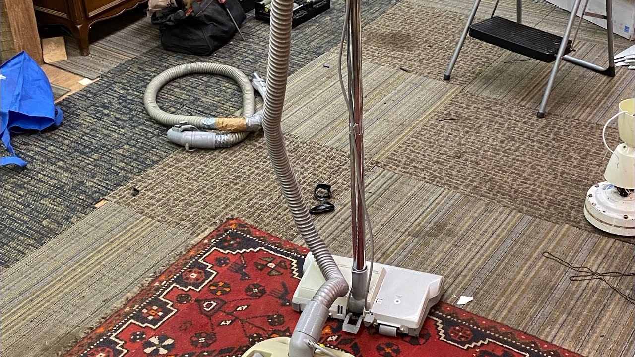 Grey and yellow Kenmore 3.9 Powermate canister vacuum late 80s