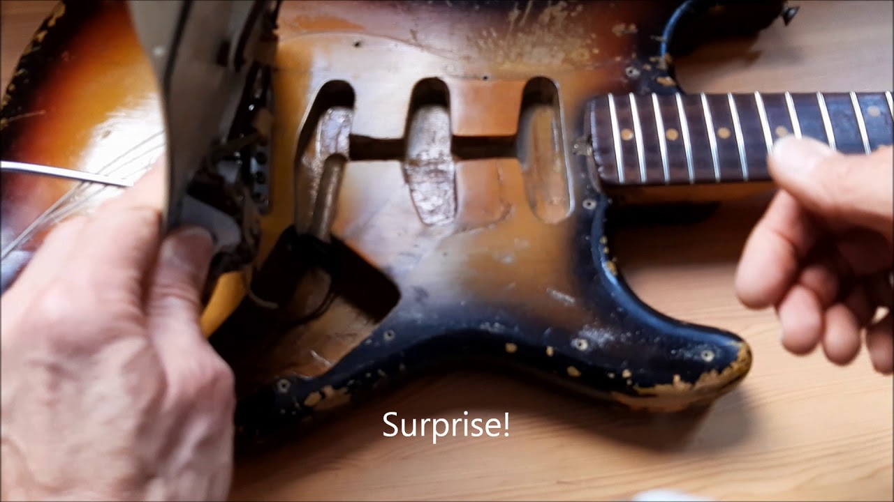 My 1962 Fender Stratocaster on the workbench - inside and outsight
