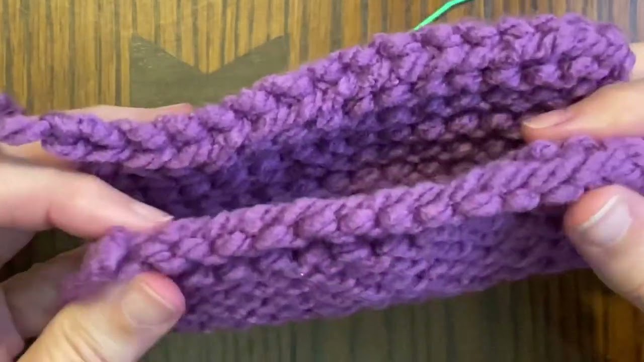 Knitting a scarf for Susan using pencils as needles