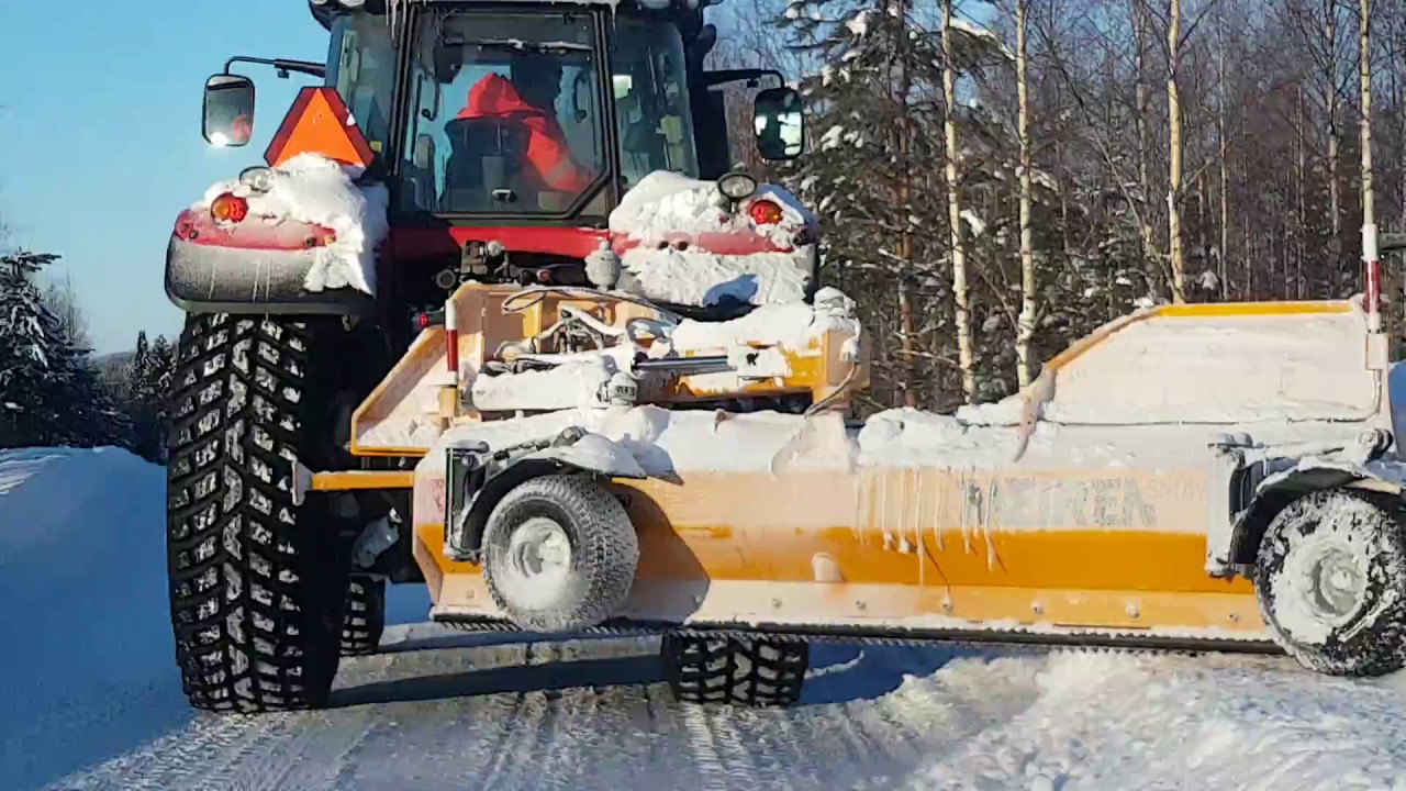 Cutting snowbanks with Meiren new rear blade