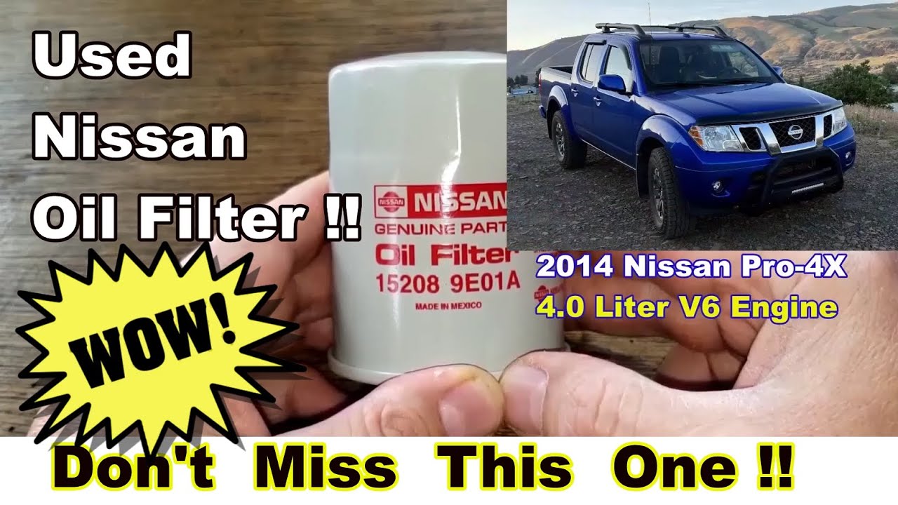 Nissan Oil Filter 15208-9E01A Cut Open, Used Nissan Oil Filter Cut Open