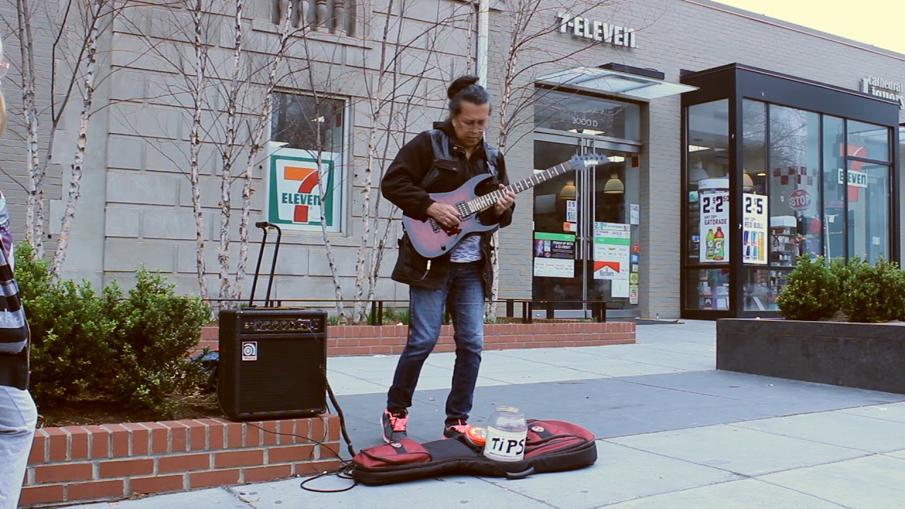 Carlos Santana - Samba Pa' Ti cover by an old lady busker at the street