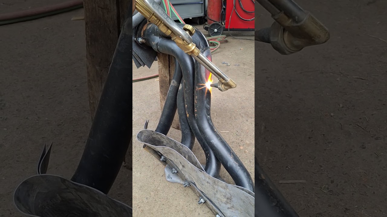 Repaired dented headers using heat and air pressure