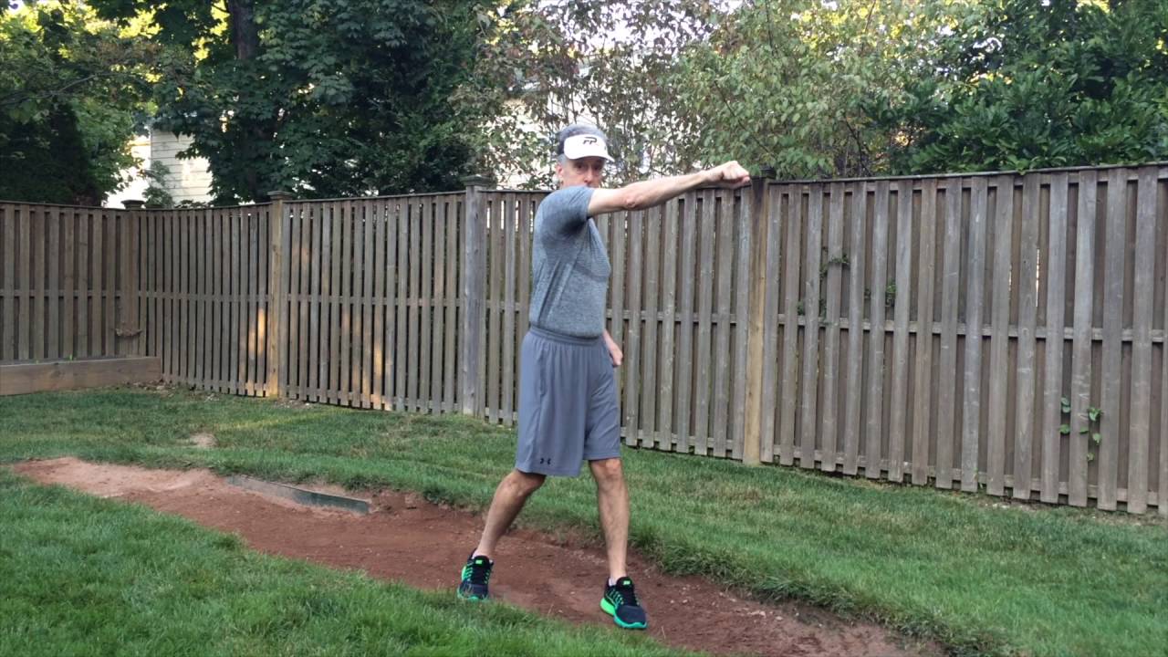Softball Pitching Mechanics: Flexion vs. Extension