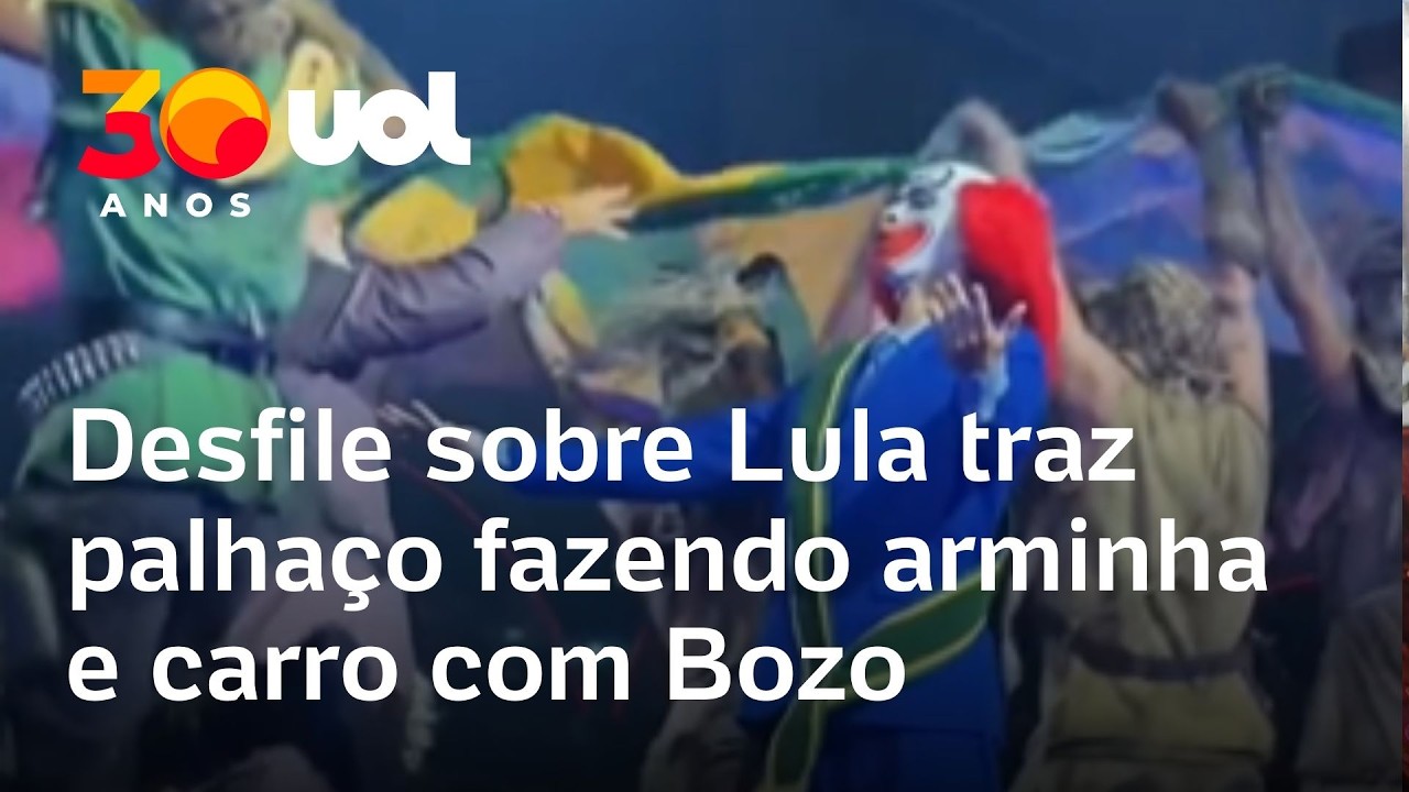 Comissão de frente de desfile sobre Lula traz palhaço fazendo arminha com a mão