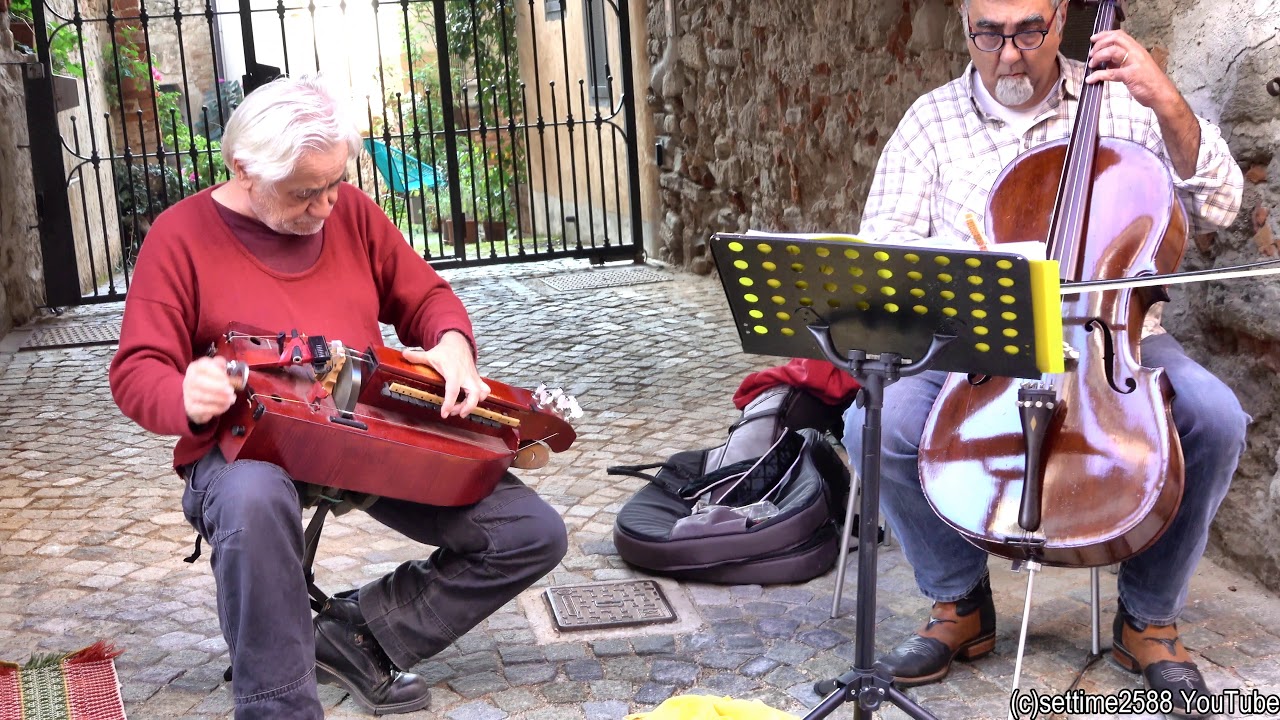 Hurdy Gurdy and Cello. Street Music Concert in La Morra, Langhe, Italy