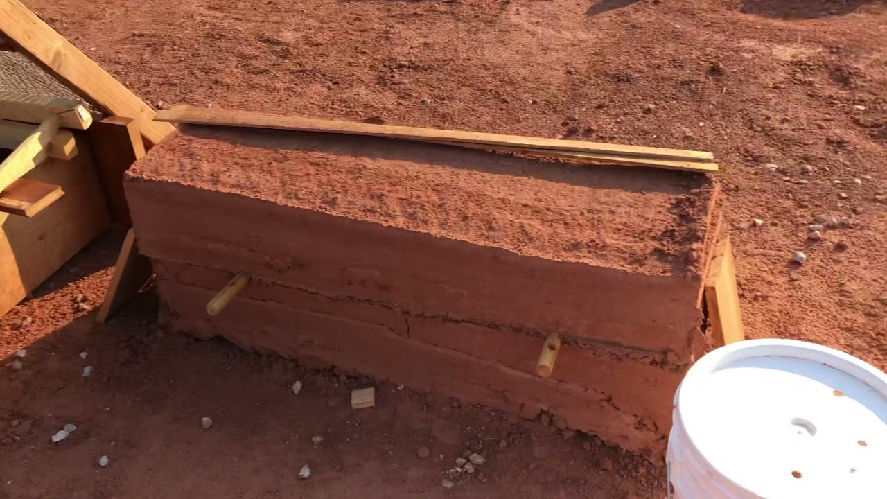 Rammed Earth Primitive with wood forms easy enough for men women and children