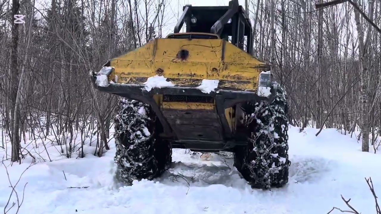 Cutting some log with the John deere 540 skidder