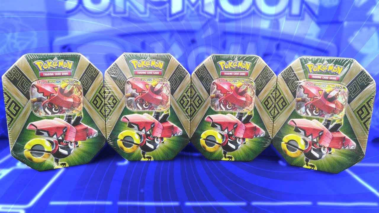 Opening 4 Tins of Pokemon Cards!