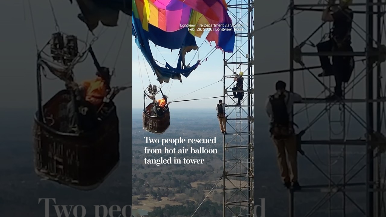 Two people rescued from hot air balloon tangled in tower