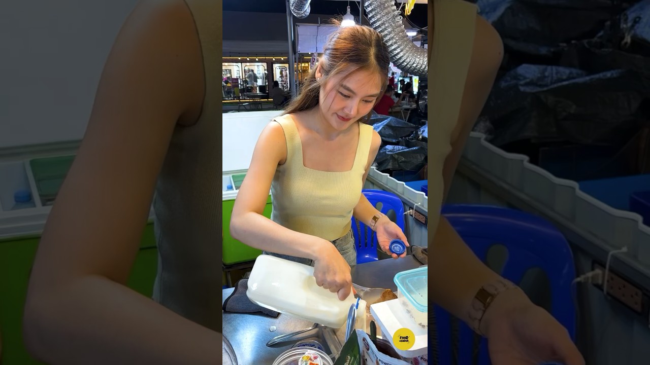 Beautiful Young Lady Makes Strawberry Ice Cream Rolls. - Thai Street Food