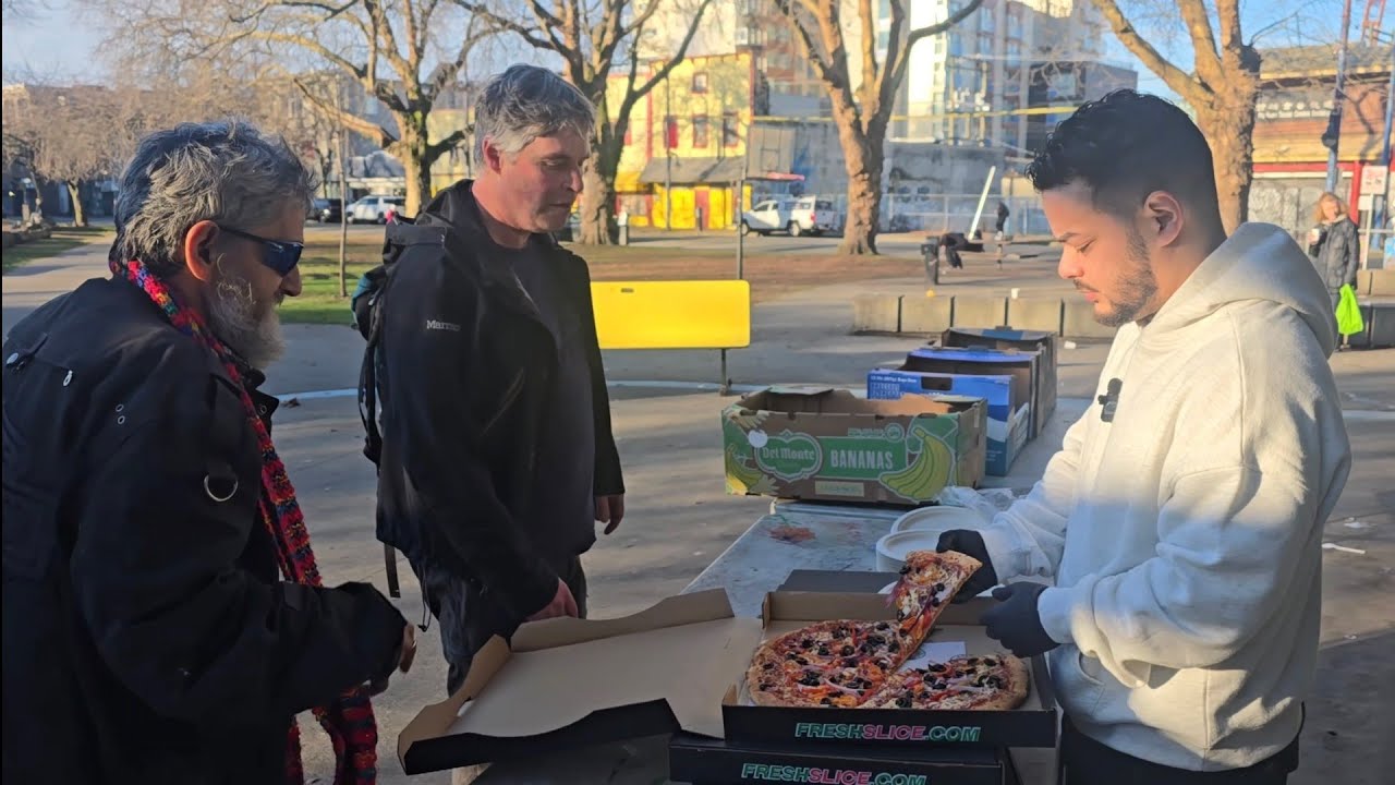 Feeding Pizza To The Homeless Community on New Years!