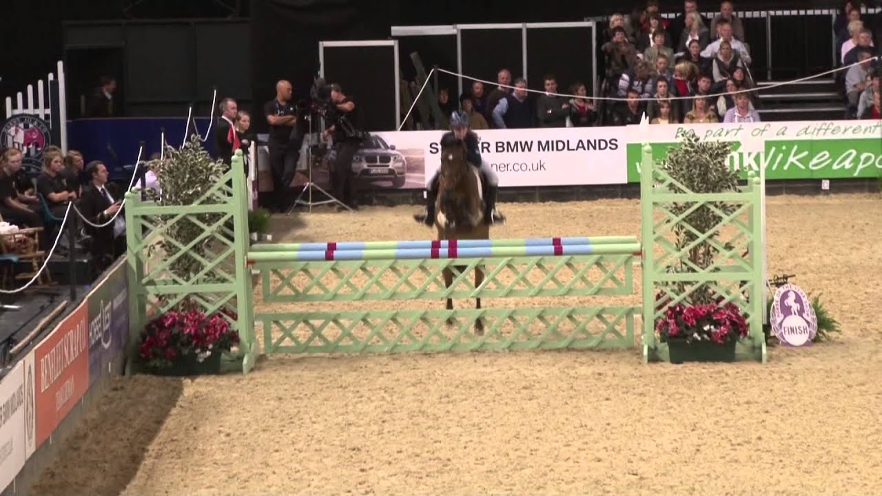 Scarlett Charles Winning The 128cm Championship at HOYS