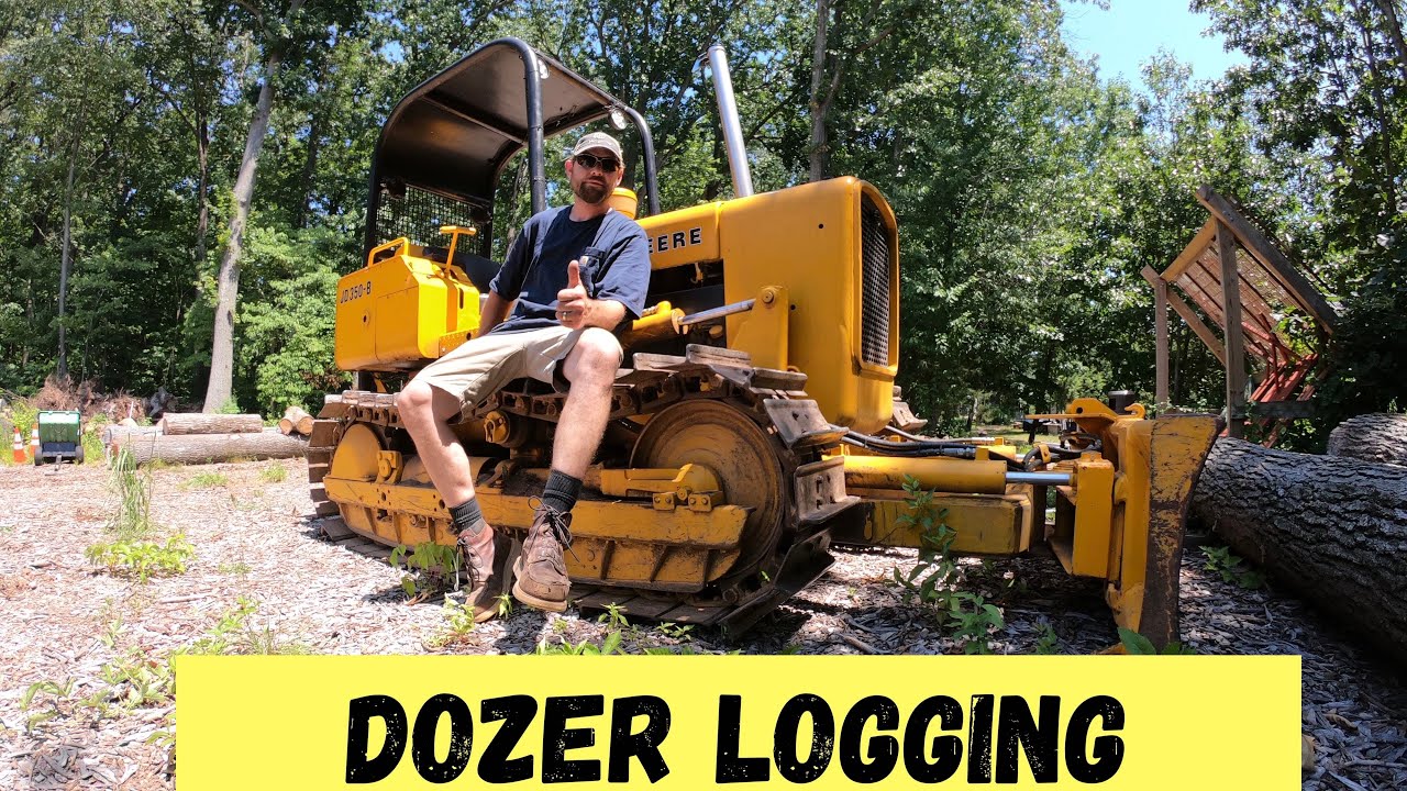 John Deere 350B Pulling big logs