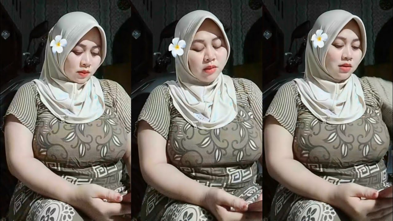 Bunda jilbab cantik bohay manis alami duduk santai terdiam sepi