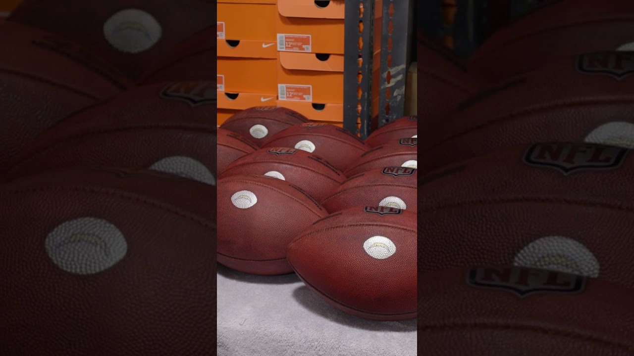 how an nfl football is broken in