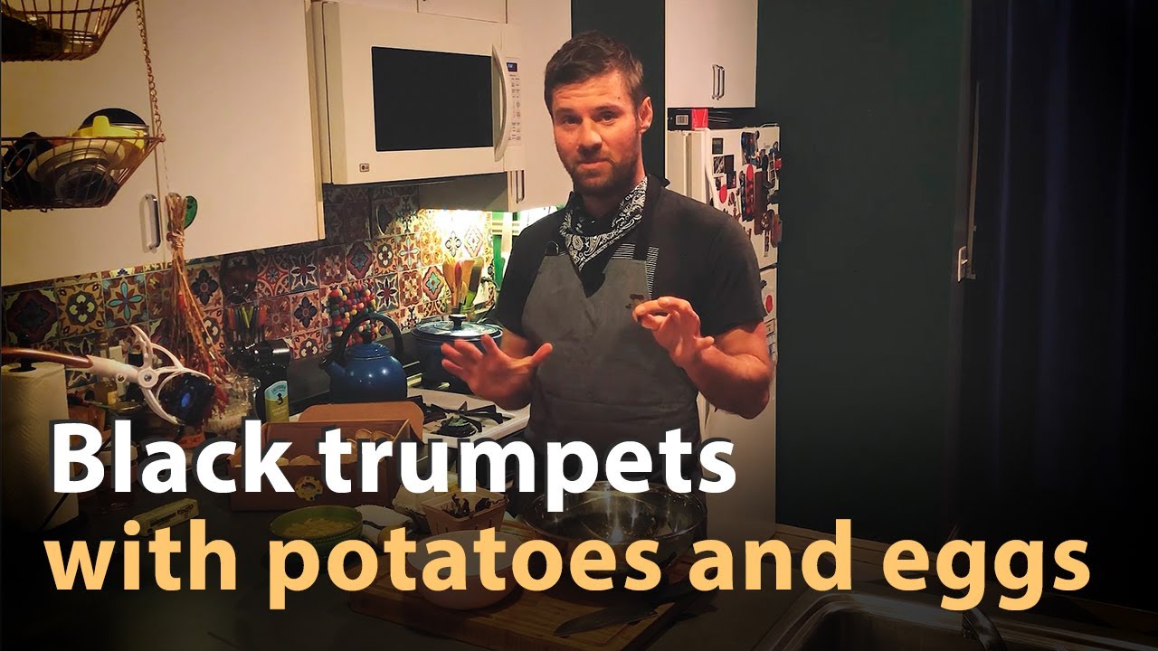 Black trumpets with potatoes and eggs