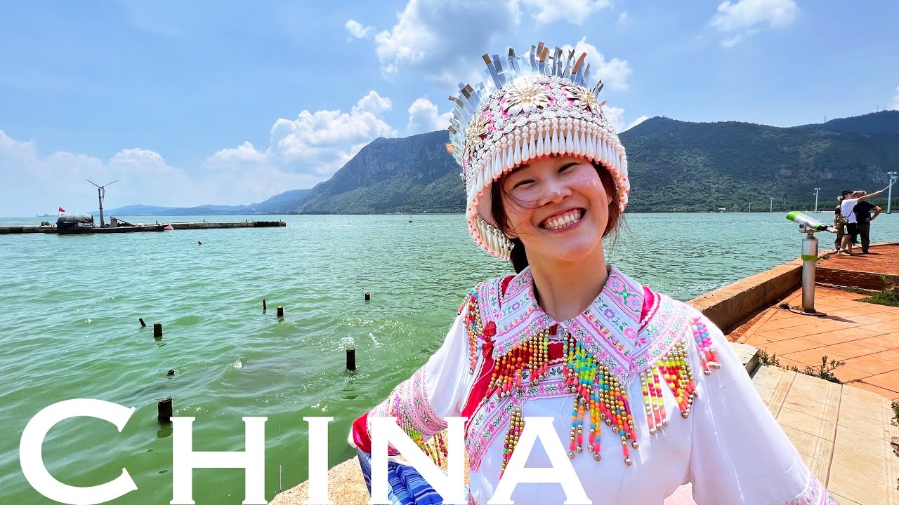 China Travel - Best Natural Lakeside Park in Kunming China | Taking a cruise Trying ethnic costume