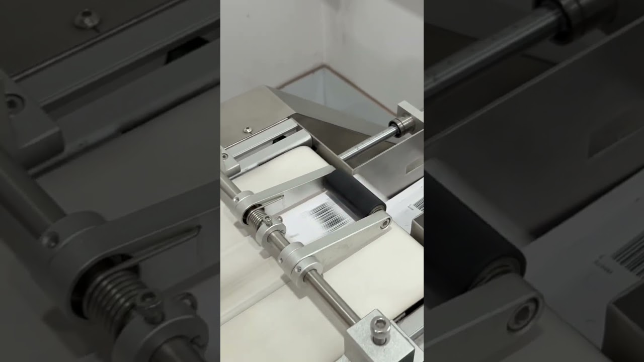 Automatic sticker attach on hang tags ! Efficient and accurate  #manufacturing #vietnam#automation