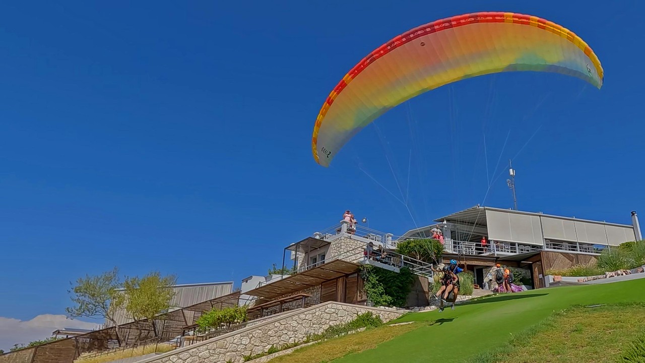 Would YOU try paragliding? Kathisma Beach #adventure #Lefkada #paragliding