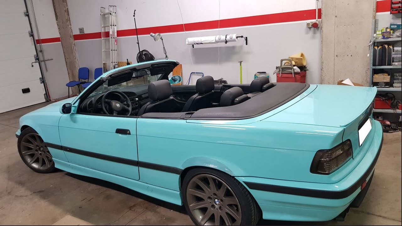 Reparación del techo descapotable del BMW E36, cambiar capota de lona estrepada por una nueva.