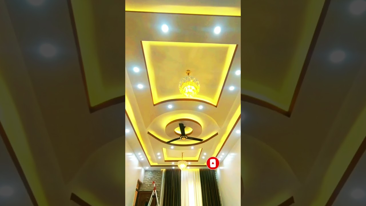pop false ceiling design for living room with one fan 