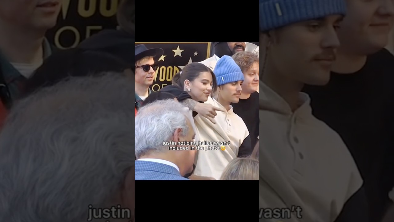 Justin Bieber noticing Hailee Steinfeld wasn't included in the photo 🥹