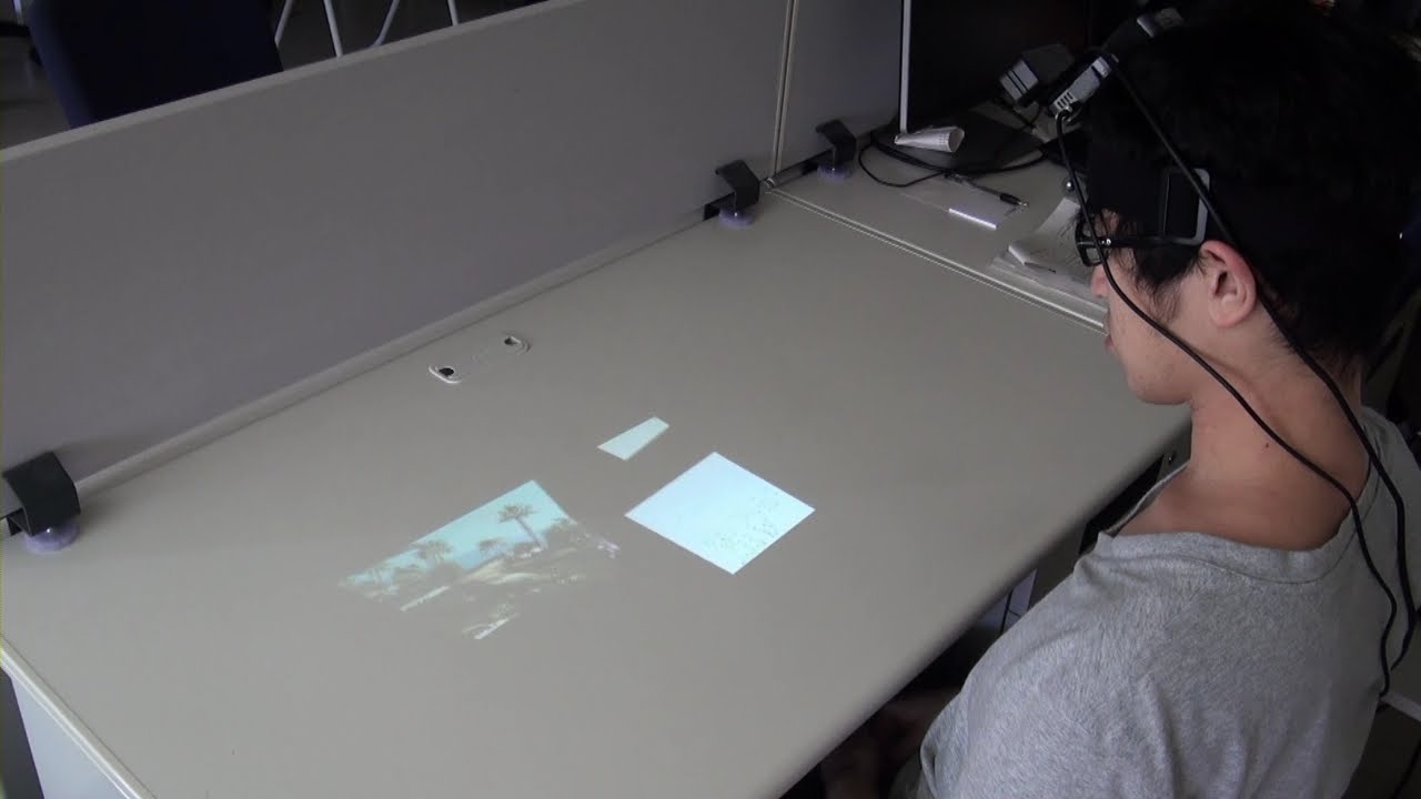 AR Tabletop Interface using a Head-Mounted Projector