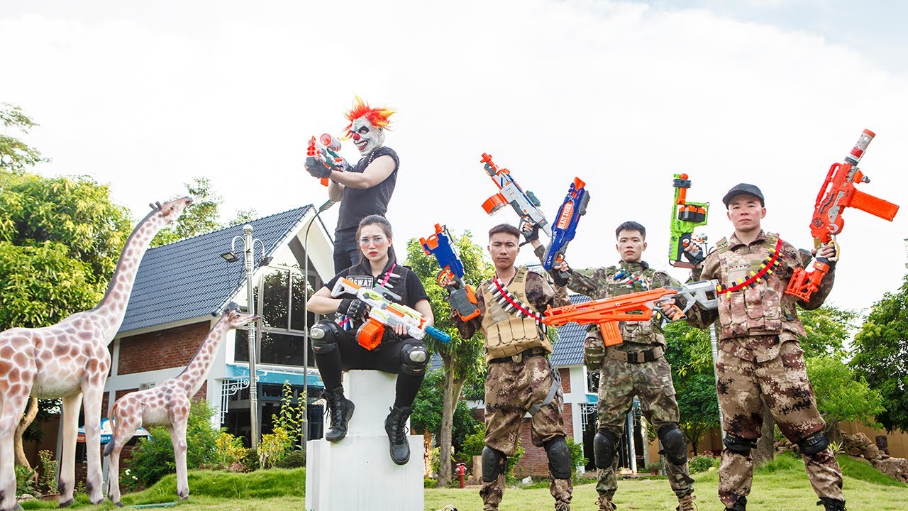 Gugu Gaming : Couple Warriors X Man SWAT Nerf Guns FIGHT Criminal Group DR.SCRAZY