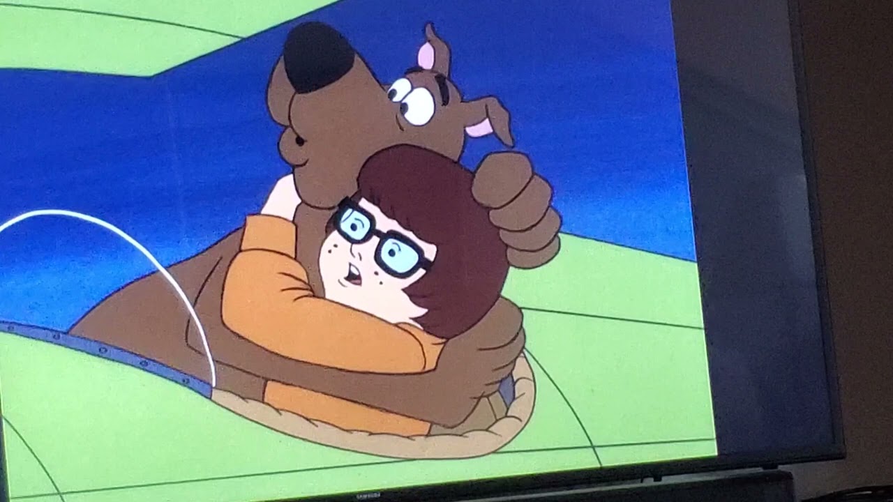 Nicole jaffe David as Velma and Scott Innes as Scooby Doo from 2003