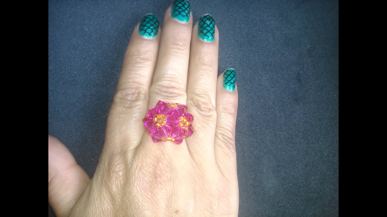 Anillo cristal swarosky dos flores.