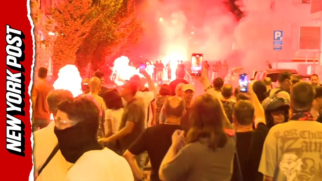 Clashing Protesters Shoot Fireworks During Heated Standoff in Serbia, Causing Police To Intervene