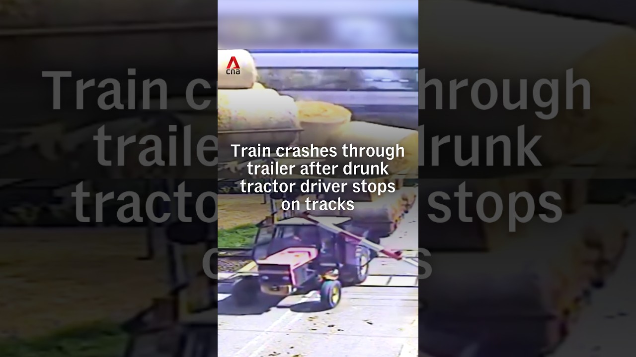 Train crashes through trailer after drunk tractor driver stops on tracks