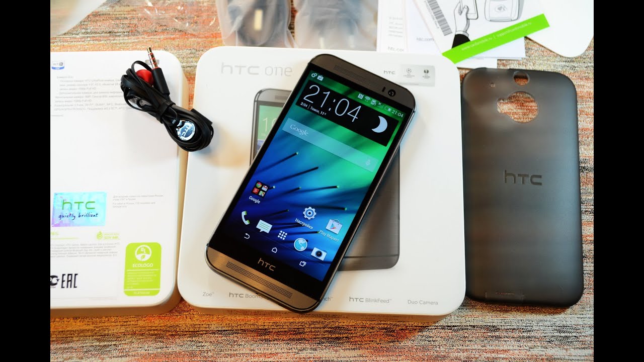 Распаковка HTC One (M8), демонстрация чехла и первое включение (unboxing)