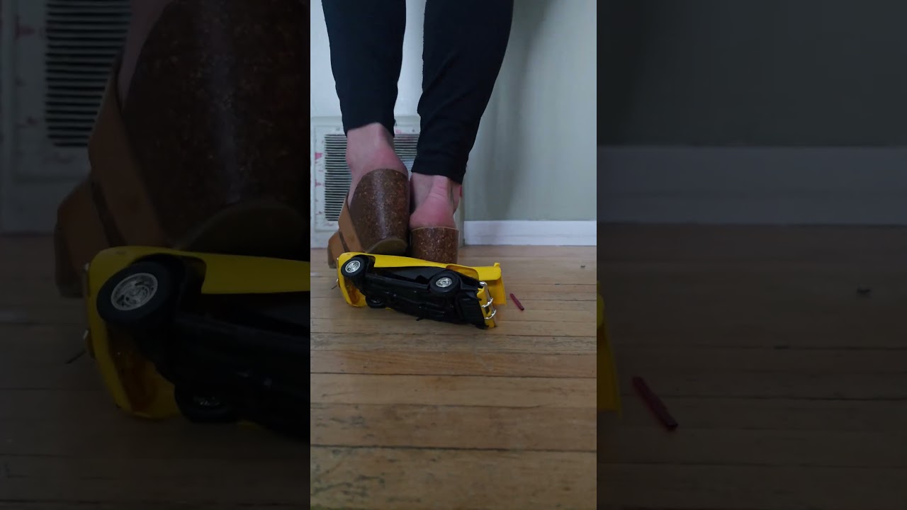 Plastic model car crushed in wedged heels 