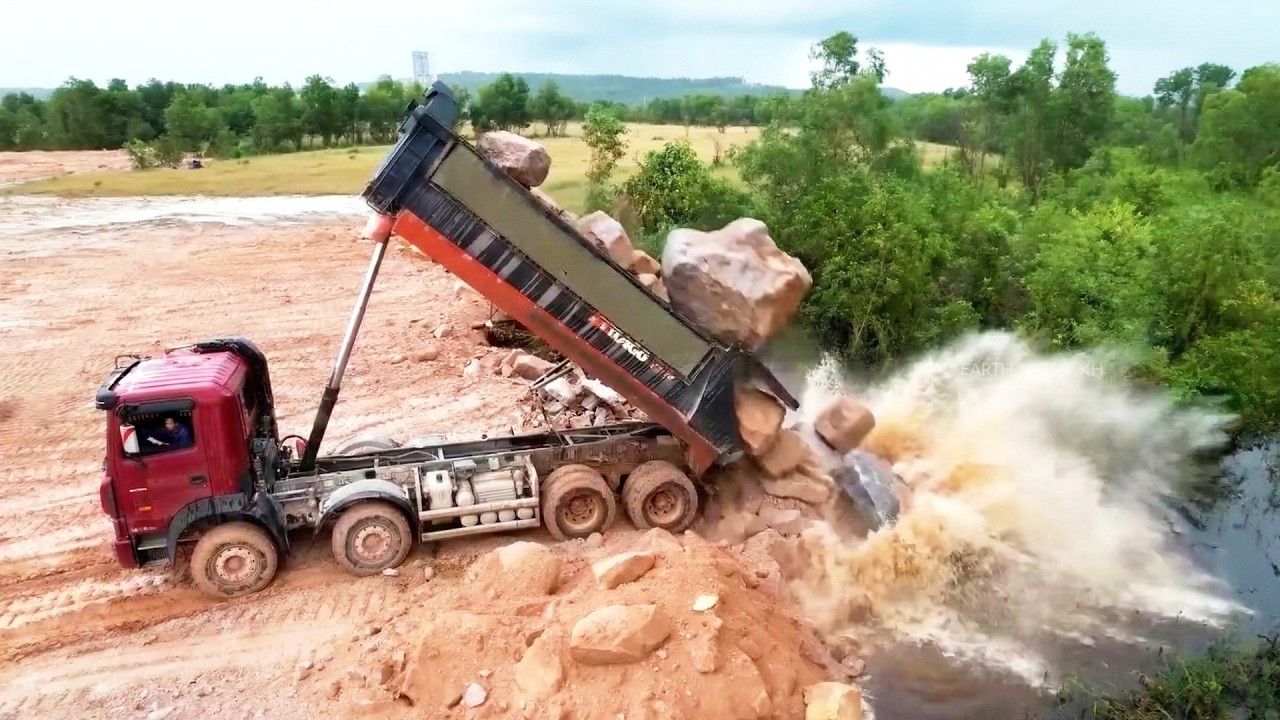 Awesome Mighty Dump Trucks Hard Work Transport & Dumping Massive Stones Filling in Lowland Area