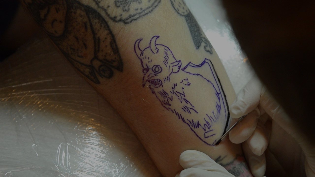 Hand poke tattoo.  Tattooing process