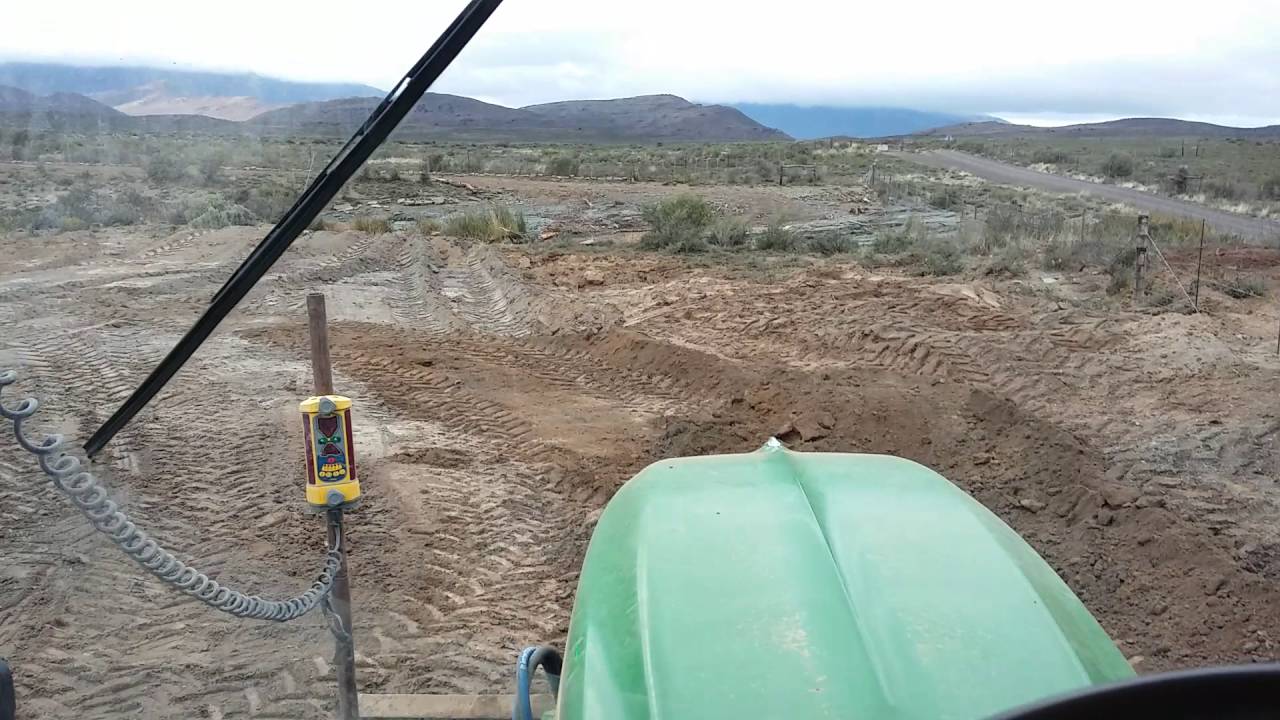 John Deere 6930 laser level with front blade