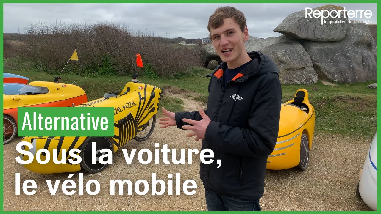 Sous la voiture, le vélomobile