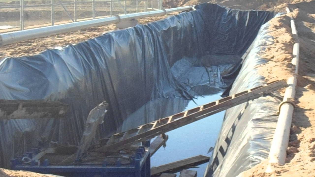 Loaded Skips lifting by crane