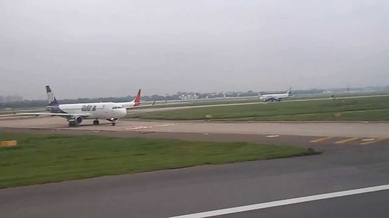 LH762 taking-off from New Delhi Indira Gandhi International runway 9 on a cloudy monsoon day