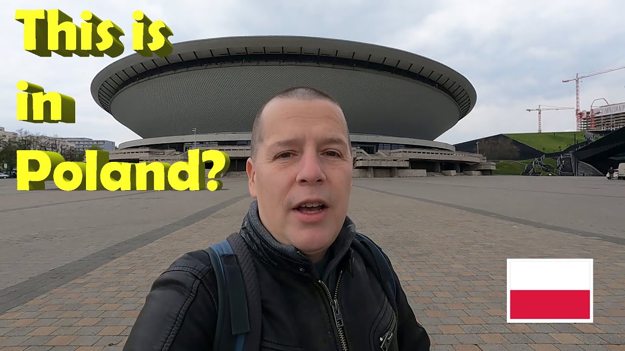There are SKYSCRAPERS in KATOWICE and a STADIUM that looks like a UFO.
