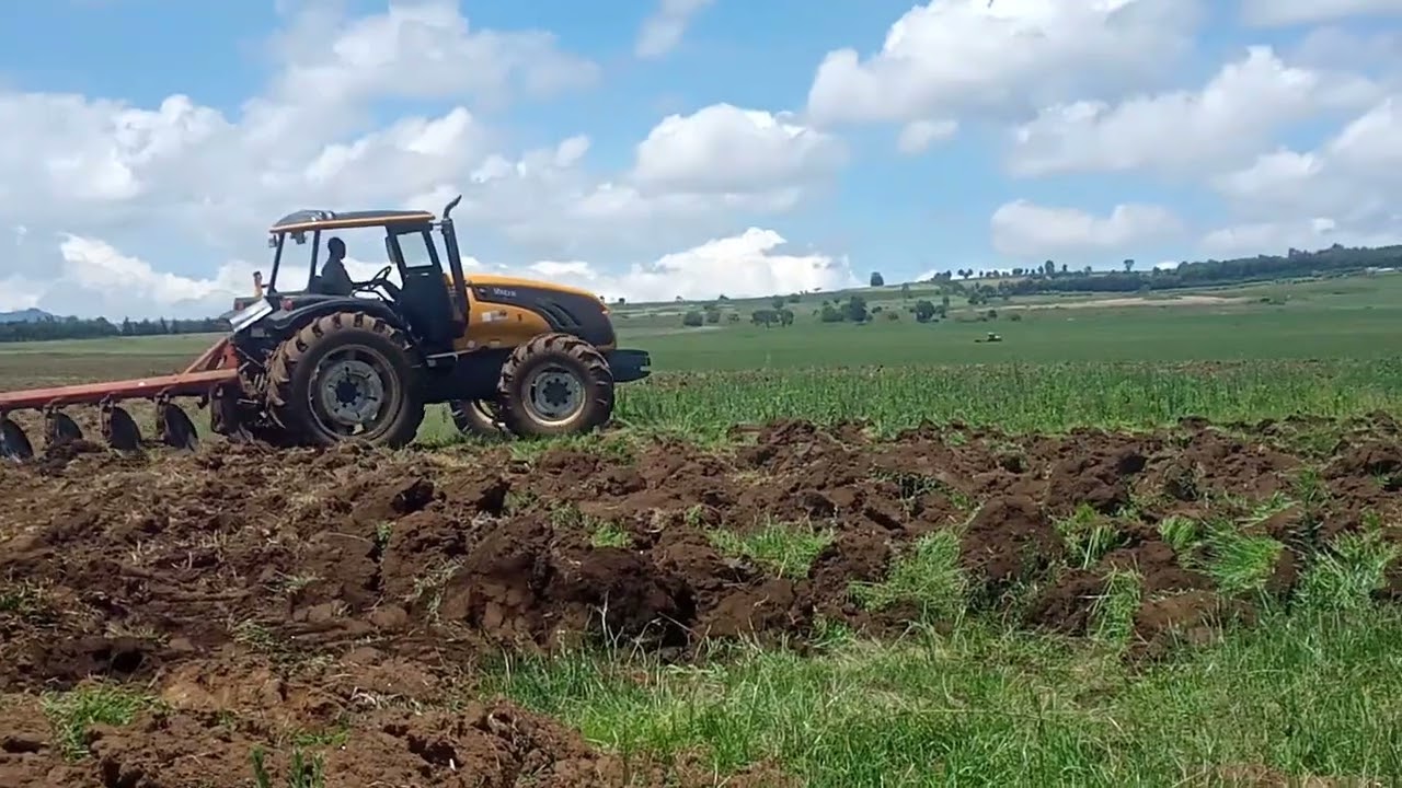 Step 1 of Maize Farming: Tractor Ploughing the Land 🌽