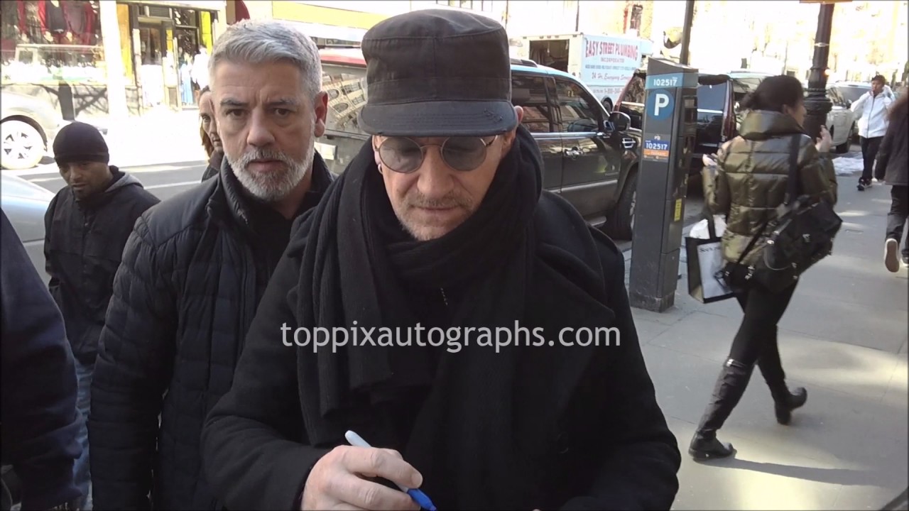 Bono - SIGNING AUTOGRAPHS while promoting in NYC