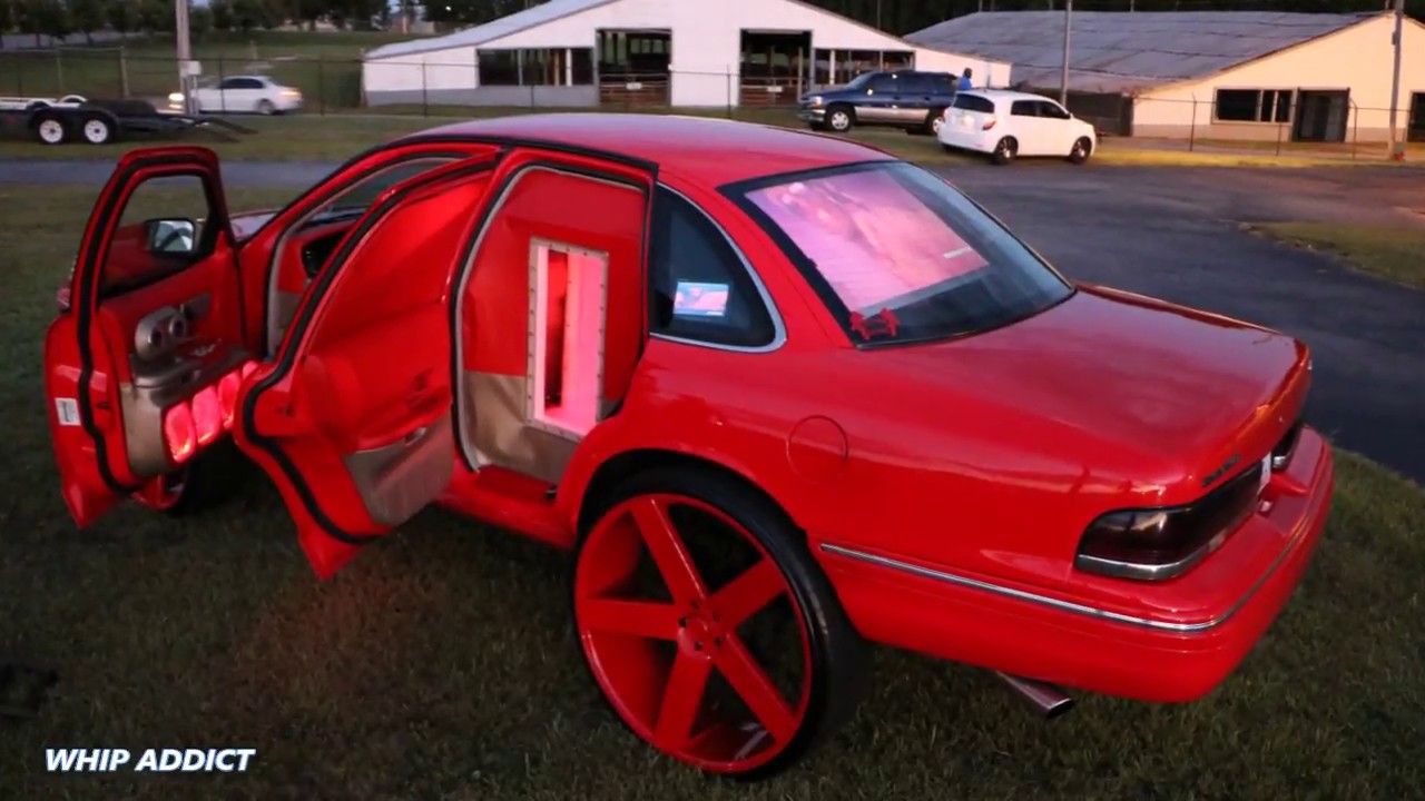 WhipAddict: Red Ford Crown Victoria on DUB Baller 30s, Sub Wall, TV Screens