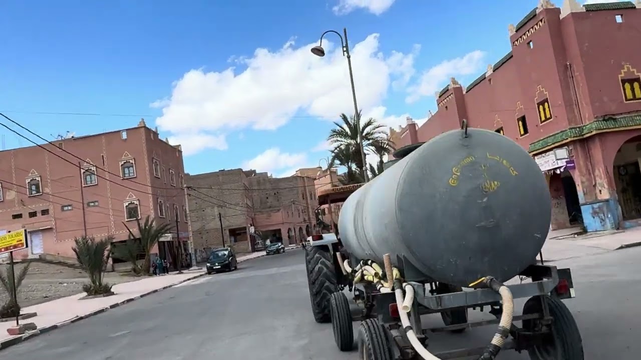 Riding through Zagora (Morocco) with a local guy. This time, I’m the passenger!