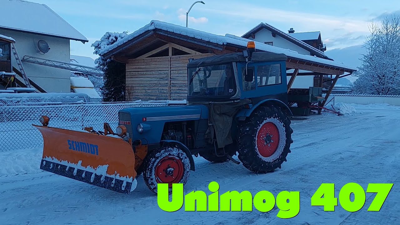 Unimog 407 Schneeräumen der Hofstelle mit dem Eicher Tiger II und Schmidt Schneepflug